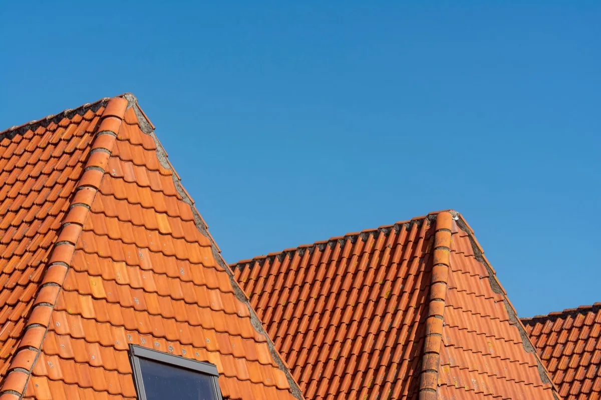Clay barrel tile rooflines on homes in Peoria, IL